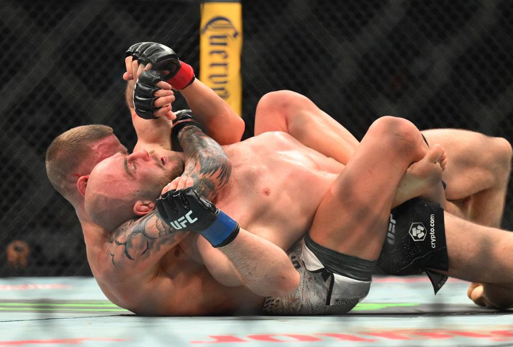 Grant Dawson s'impose par soumission face à Mateusz Rebecki au terme d'un affrontement riche en rebondissements | UFC 328